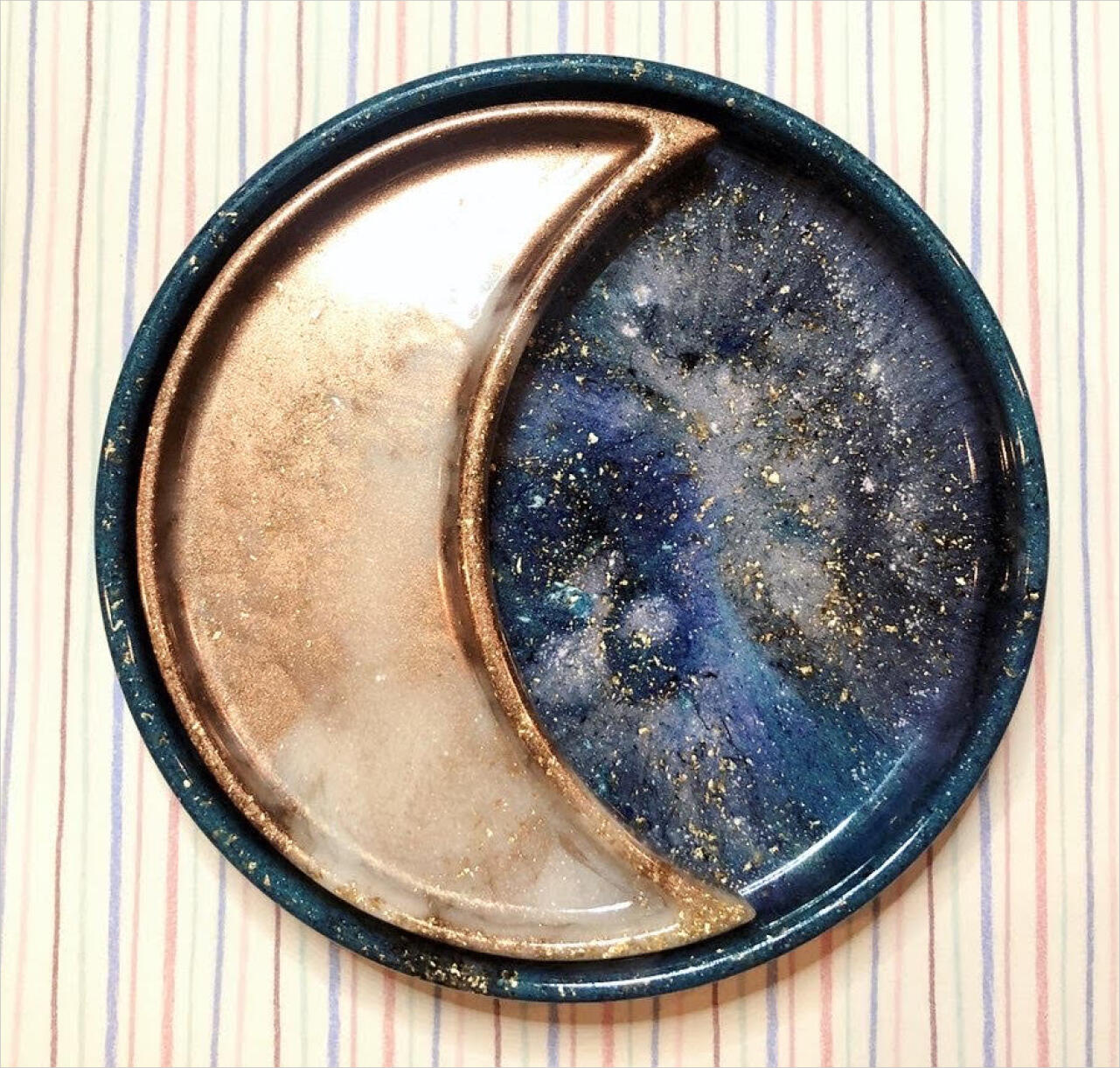 Moon shaped resin dish nesting within a round dish